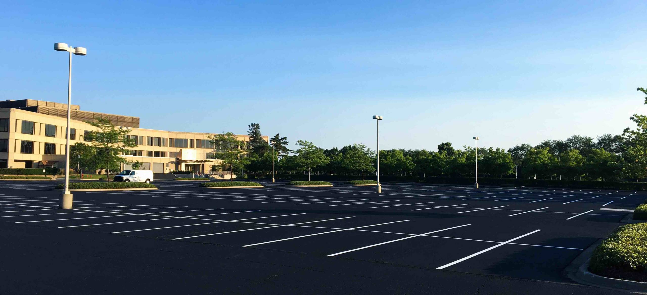 Proper Parking Lot Striping, Signage and Parking Blocks